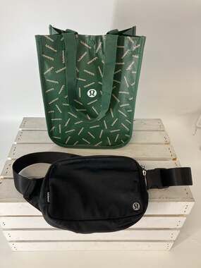 LULULEMON BLACK WAIST BELT BAG WITH GREEN SHOPPING TOTE